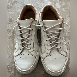 Nike white tennis shoes, preowned, overall in pretty good condition, size 7